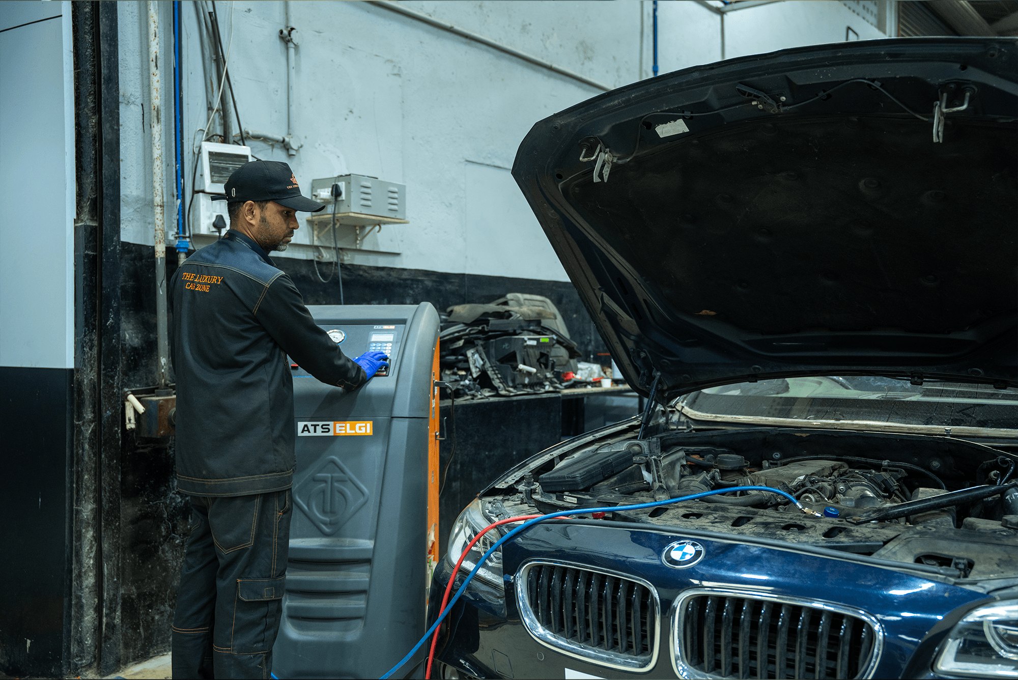A technician servicing the climate system