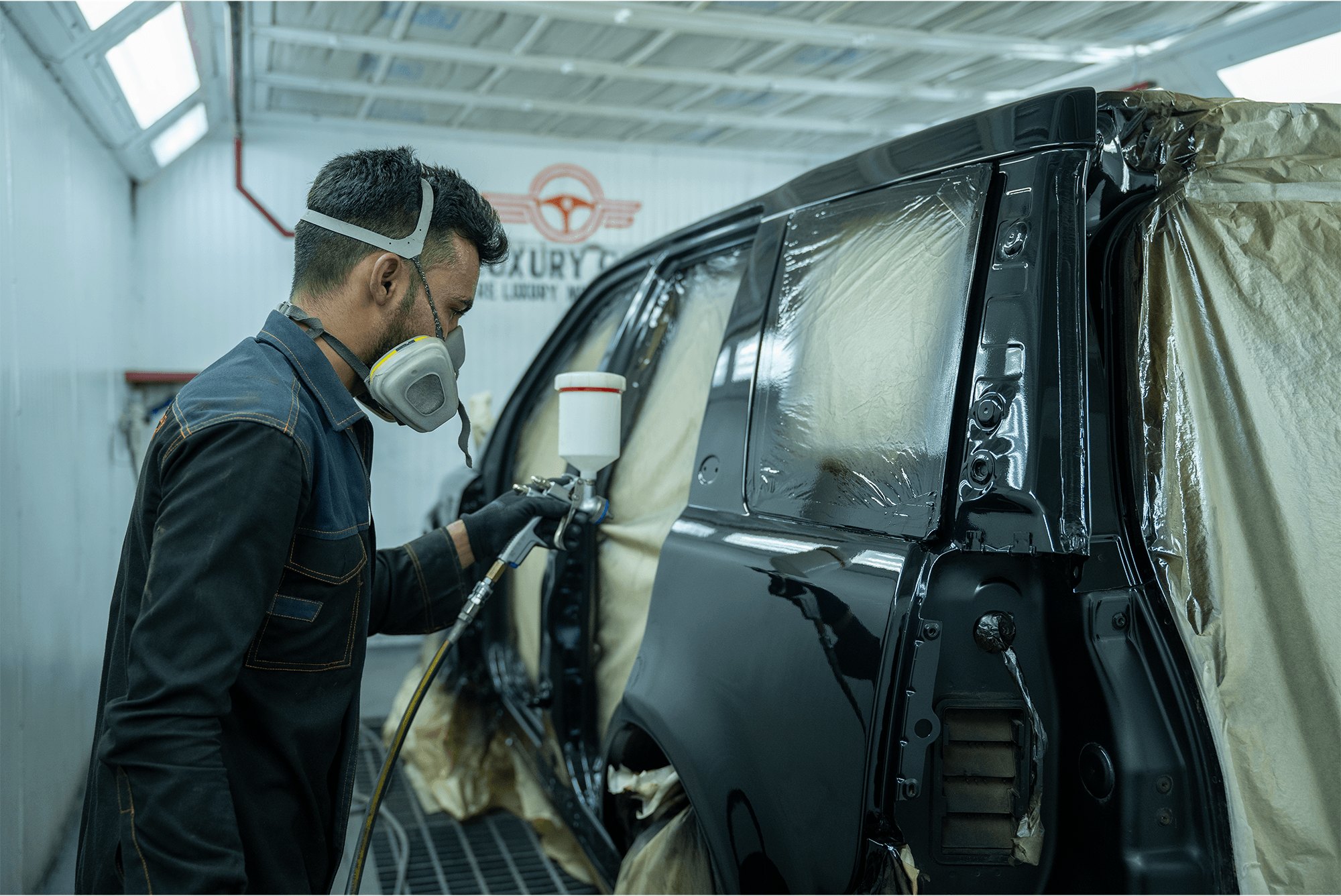 Precision panel work on a blue SUV door